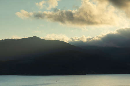 Photograph of breathtaking summer sunset landscapes, mountainous, misty and full of clouds, on the Galician coast, Ortigueira, near Cape Ortegal, La CoruÃ±a province, Spain.の写真素材