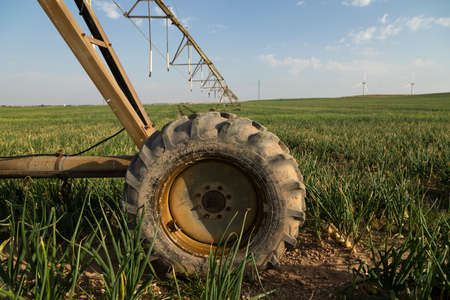 Gallur, Spain - July 27, 2020: Irrigation pivot, with water or chemigation, fed by pipeline, example of agricultural machinery and agro-industrial infrastructures in crop fields in Aragon.のeditorial素材