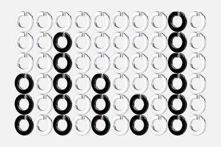 Abstract figure representing an information and data analysis bars chart, formed by photographs of metal washers, created by photo composition, on a white background. Represents variable growth.の写真素材