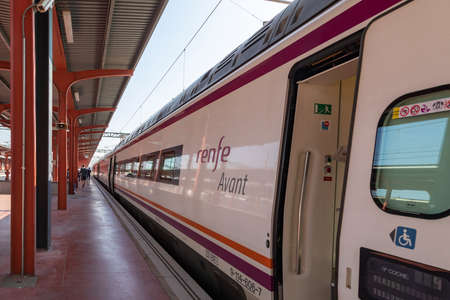 Madrid, Spain - June 2, 2021: Renfe Avant medium distance with the door open, parked on one of the...