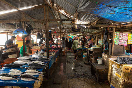 Waisai, Indonesia - Oct 17, 2019: Stalls selling freshly brought fish, shellfish and molluscs, in one of the Waisai marking areasのeditorial素材