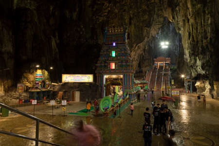 Batu Caves, Malaysia - Nov 04, 2019: Ornate and polychrome Hindu temples inside the Batu Caves, a famous place of worship and pilgrimage north of Kuala Lumpur, Malaysiaのeditorial素材