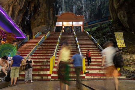 Batu Caves, Malaysia - Nov 04, 2019: Access stairs to the Hindu temples inside the Batu Caves, famous place of worship and pilgrimage north of Kuala Lumpur, Malaysiaのeditorial素材