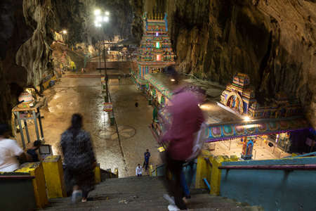Batu Caves, Malaysia - Nov 04, 2019: Access stairs to the Hindu temples inside the Batu Caves, famous place of worship and pilgrimage north of Kuala Lumpur, Malaysiaのeditorial素材