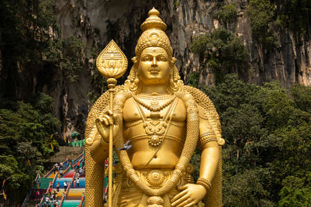 The huge statue Sri Muruga, the Hindu god of war, guards the access area to the Batu Caves, in the Gombak District, Selangor, Malaysiaのeditorial素材