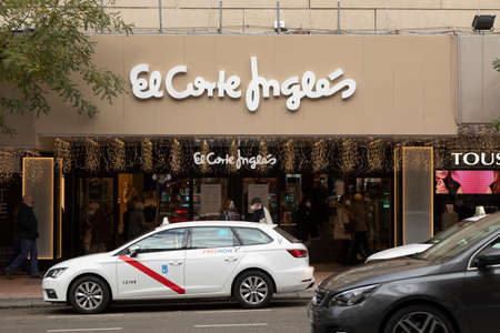 Madrid, Spain - Nov 25, 2020: Very crowded access area to one of the large clothing stores of the El Corte Ingles company, located on Goya streetのeditorial素材
