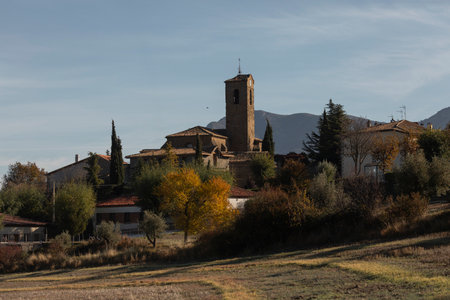 Autumnal skyline of the small town of Bailo, with its tower of the church de San Fructuoso, in the...
