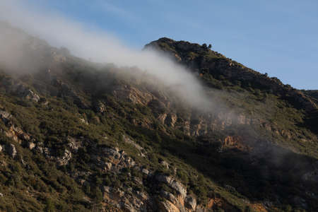 Mists and low morning clouds, between the slopes that surround the GÃ¡llego river, in the Hoya de Huesca region, Aragon, Spainの写真素材