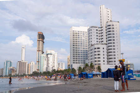 Cartagena de Indias, Colombia - Nov 21 2010: Skyline of buildings and skyscrapers under construction, urban landscape, next to Bocagrande beach, on a cloudy and stormy dayのeditorial素材