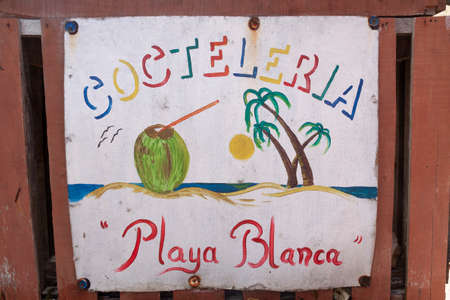 Cartagena de Indias, Colombia - Nov 22, 2010: Poster of a cocktail bar on the beach of Isla Baru, in the Colombian Caribbeanのeditorial素材