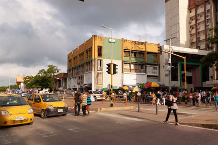 Cartagena de Indias, Colombia - Nov 23, 2010: Streets, traffic, stalls selling food and things, and bustle of people around Avenida Venezuela, on the outskirts of the historic center of the cityのeditorial素材