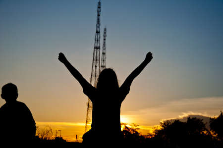 Silhouette of  happy girlの写真素材