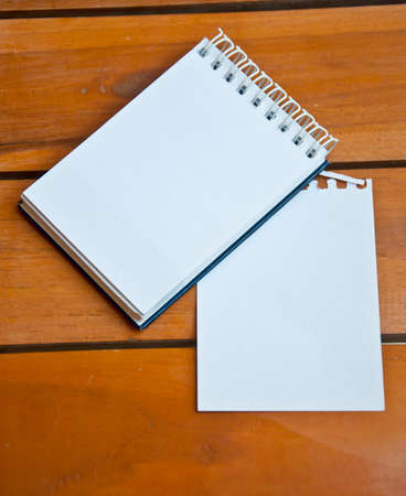 blank paper on wood backgroundの写真素材