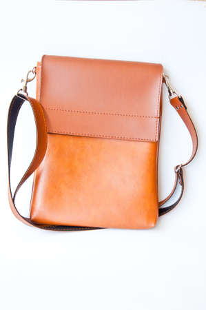 brown leather bag on white backgroundの写真素材