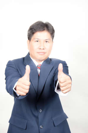 business man action thumb up for successの写真素材