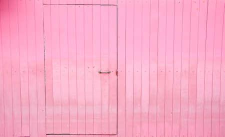 old pink wood doorの写真素材