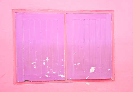 violet window and pink backgroundの写真素材