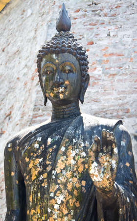 black Buddha statue in the templeの写真素材