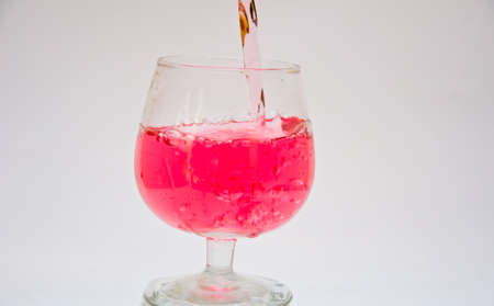 red wine on white backgroundの写真素材