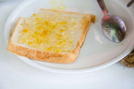 toast with pineapple jam for breakfast meal