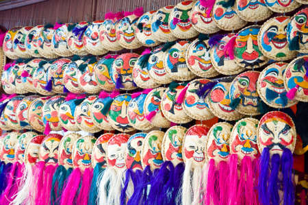 straw tray art colorful of mask from Vietnam countryの写真素材