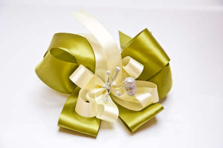 green  bow on white 