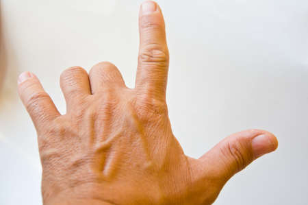 point finger from adult on white backgroundの写真素材