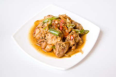 fried chicken with spicy black chili pepper ingredientの写真素材