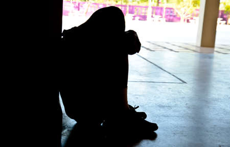 silhouette of boy depression and sadnessの写真素材