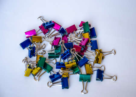 colorful of metal paper clip on white backgroundの写真素材