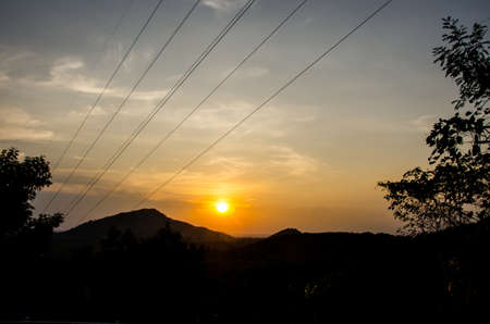 sundown with high voltage electric cable