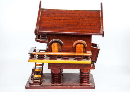 small house model from wood on white backgroundの写真素材