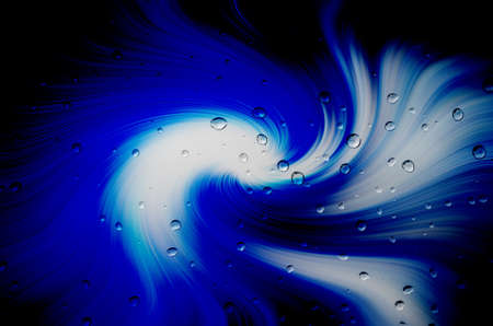 drop water with blue backgroundの写真素材