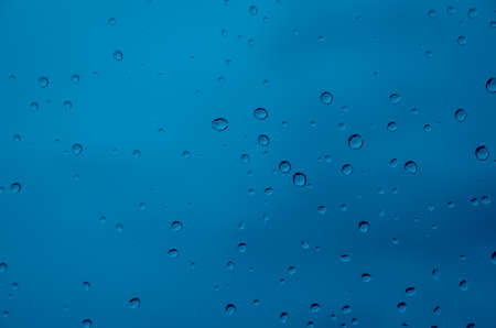 drop water with blue backgroundの写真素材