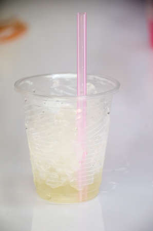 plastic glass of ice for cold drinkの写真素材
