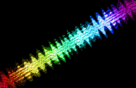 abstract  multicolor    with motion blur on black background