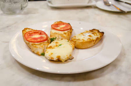 garlic bread with cheese for easy eatingの写真素材