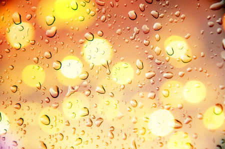 defocus of light background with drop waterの写真素材