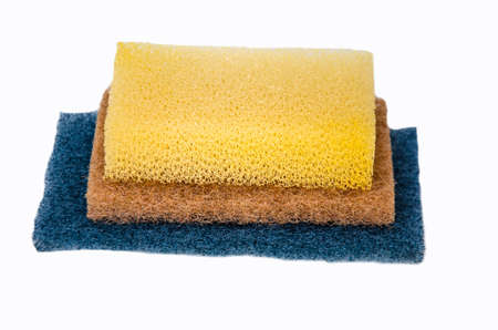 yellow and blue sponge for clean on white backgroundの写真素材