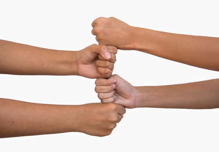 stacking fist from children on white backgroundの写真素材