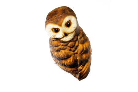 Wooden owl isolated on whiteの写真素材
