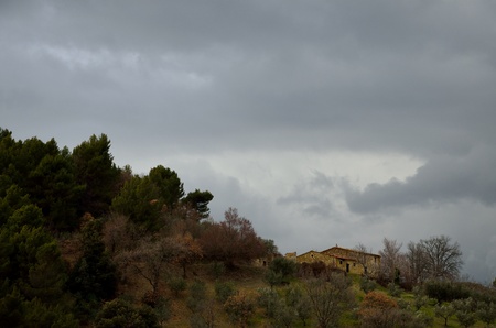 Umbria hill with the stormの写真素材