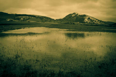 The reflect of the mountain in the waterの写真素材
