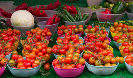 Full frame take of some crates with tomatoes on a Cambden Town market