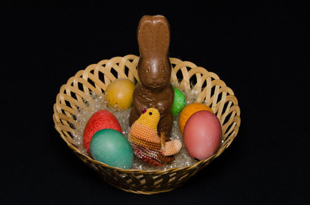 Easter chocholate bunny on the eggsの写真素材