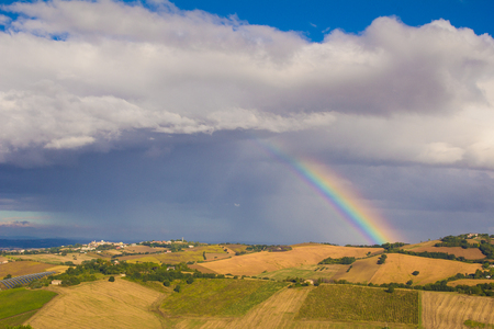 Rainbow over the Montesicuro village, Marche - Italyの写真素材