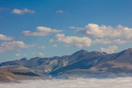Medieval umbria village suspended on the cloudsの写真素材
