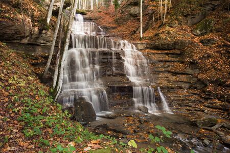 Waterfall in the autumn national park of foreste casentinesi, Tuscany - Italy.