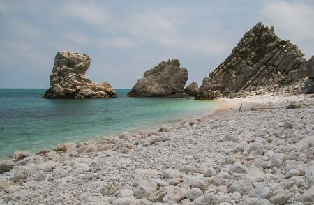 Summer vacation at adriatic sea. View of Spiaggia delle due sorelle (Two sisters bach), Monte Conero, Marche - Italy.の写真素材