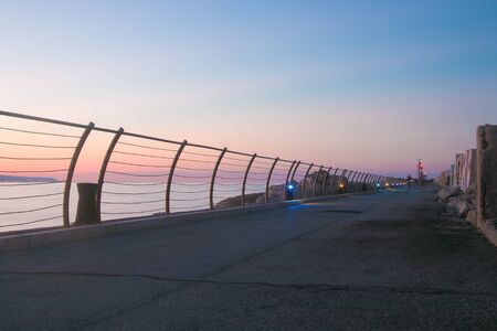 South pier of San Benedetto del Tronto at sunsetの写真素材